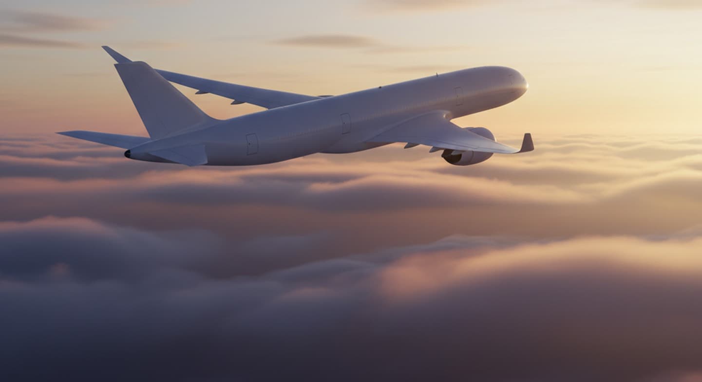 Flugzeuge fliegen über den Wolken